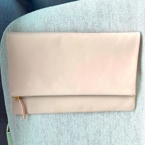Real leather Everlane flap clutch. Hardly used like new! Peach/light pink color.